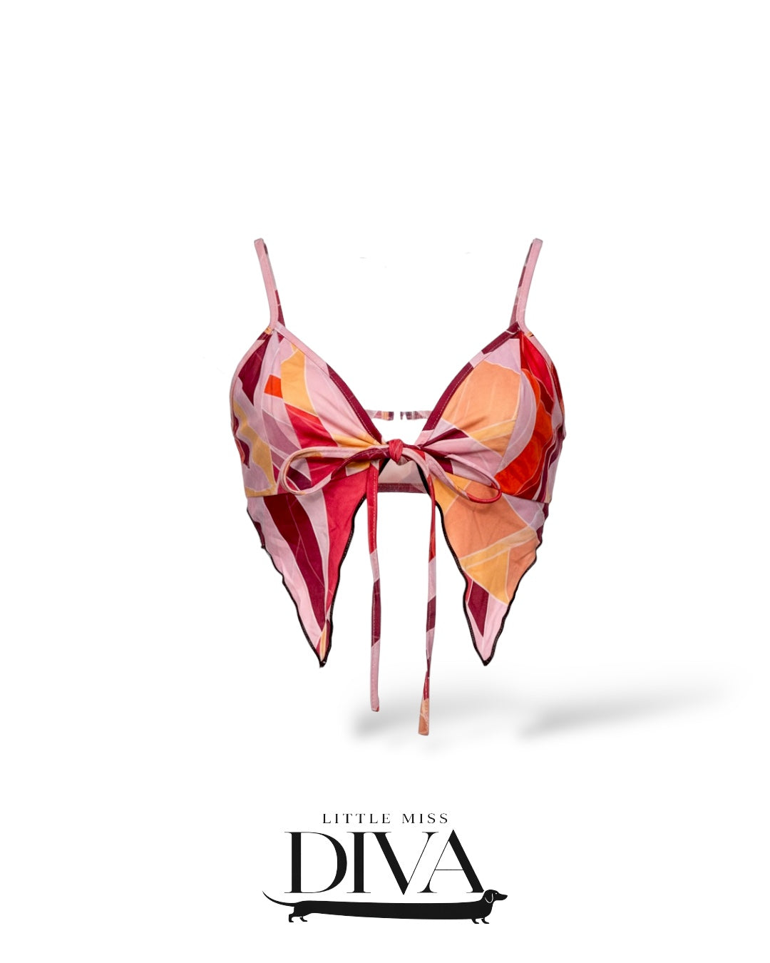 Abstract print tie-front handkerchief top with spaghetti straps and pointed hem in pink, orange, and red tones