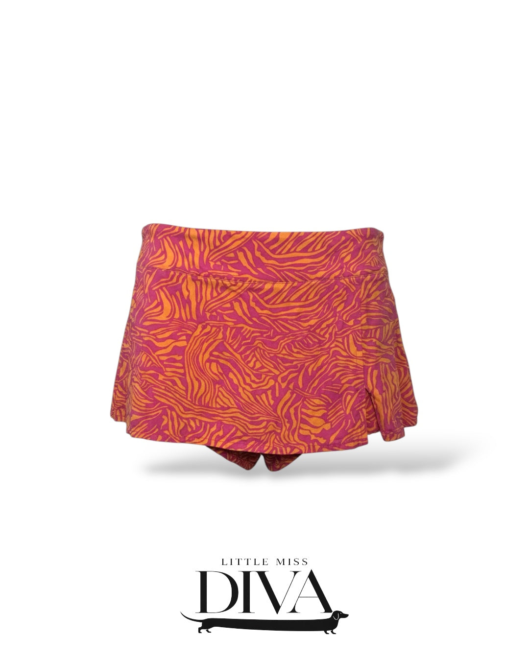 Pink and orange abstract zebra print mini skort with high-waisted fit and flared silhouette