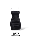 Black satin mini dress with rhinestone straps and fitted silhouette
