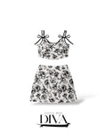 Black and white floral two-piece mini set with tie-strap crop top and matching skirt