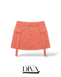 Coral utility mini skirt with cargo pockets and adjustable strap details