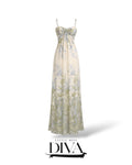Cream floral print maxi dress with ruched bust detail, spaghetti straps, and flowing silhouette