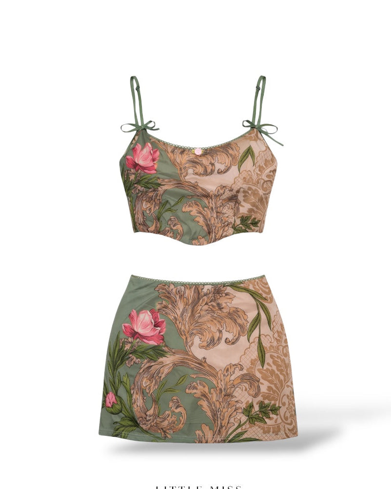 Green floral two-piece mini set with tie-strap crop top and matching skirt