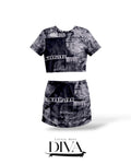 Black and gray abstract print two-piece set featuring cropped short-sleeve top and matching mini skirt