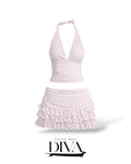 White polka dot two-piece set featuring halter top with deep V neckline and ruffled mini skirt