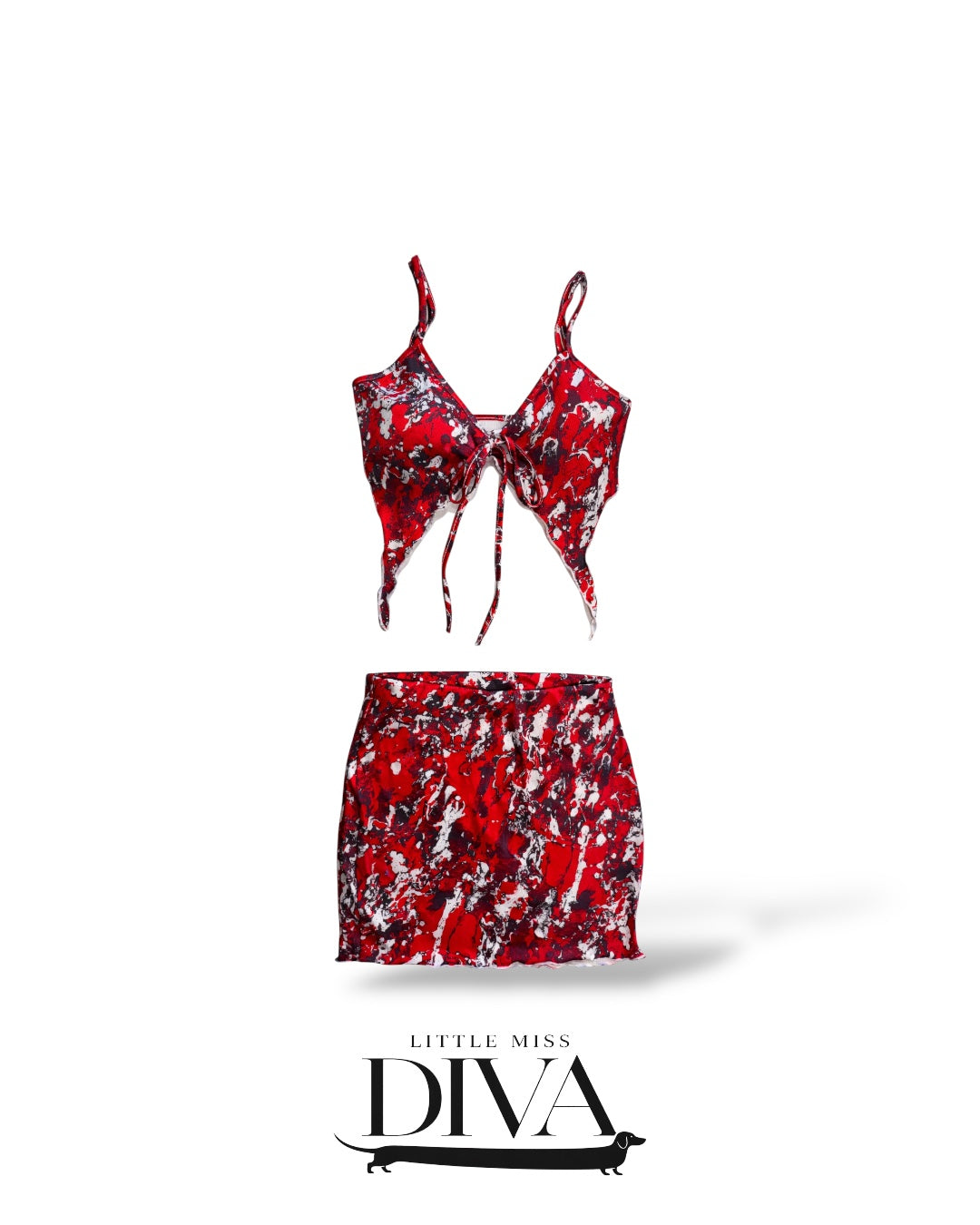 Red abstract print tie-front crop top and matching mini skirt set with asymmetrical hem and statement pattern