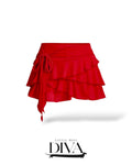Red ruffle wrap mini skirt with layered hem and tie waist detail