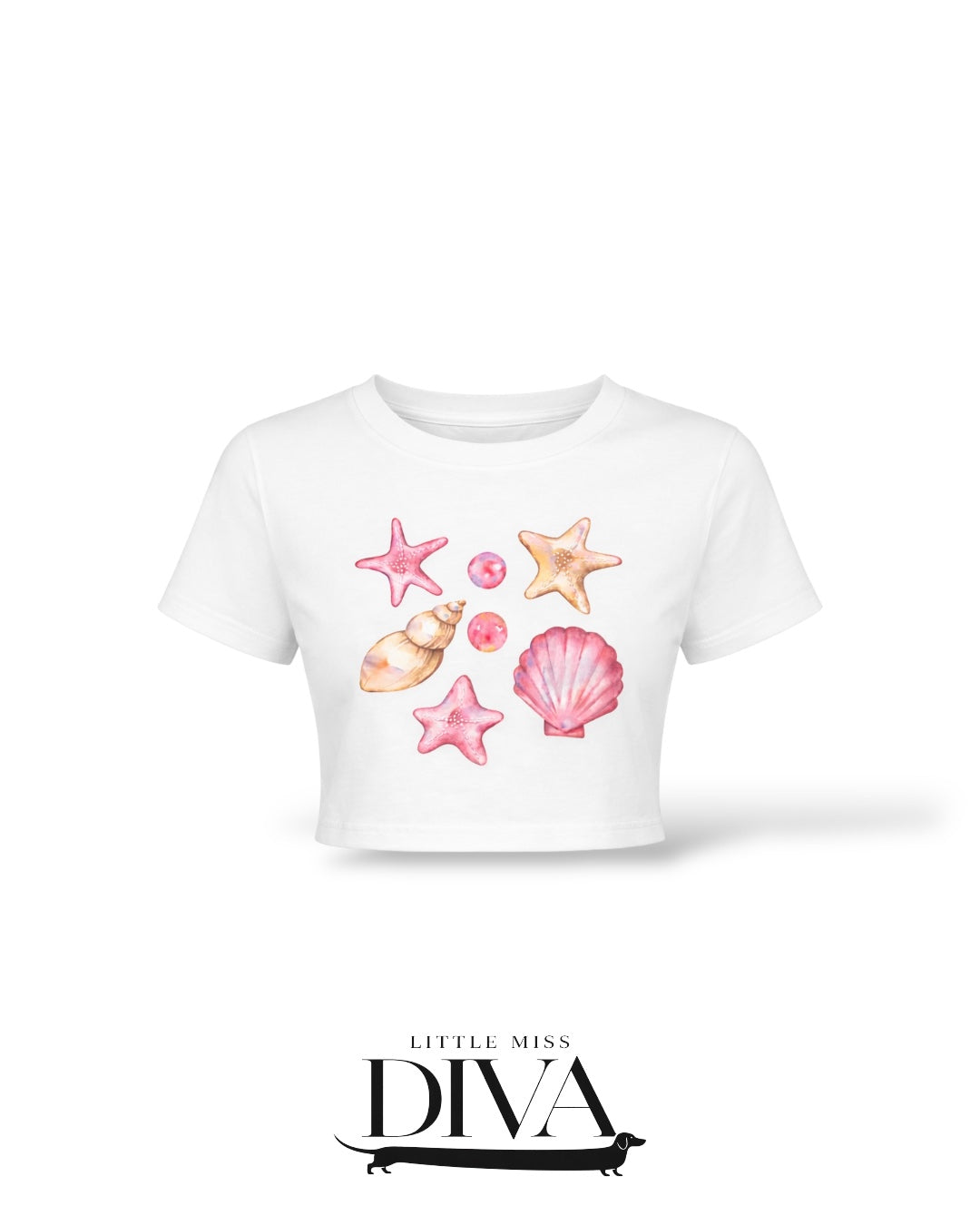 White seashell graphic crop t-shirt with pink starfish and shell print for vacation and summer birthday outfits.