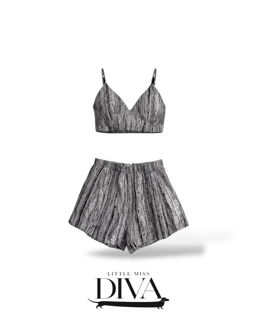 Black and white textured crop top and high-waisted shorts set with abstract vertical pattern