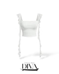 White ruched crop top with ruffle straps and fitted silhouette for birthday and special occasion outfits.